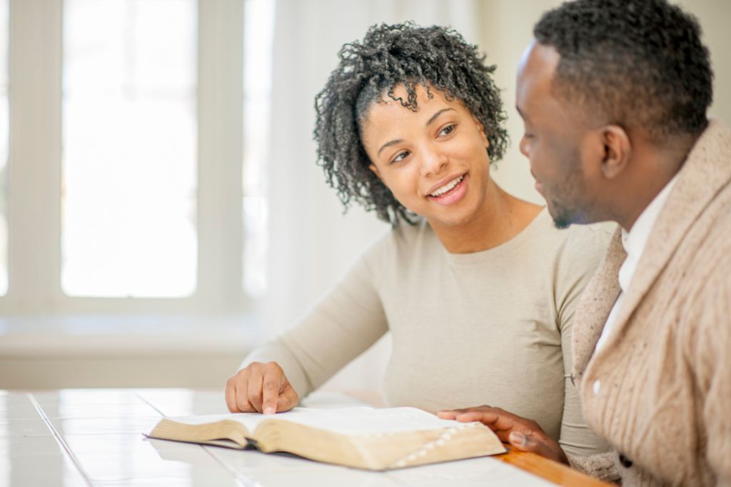Husband and Wife Studying the Bible Together