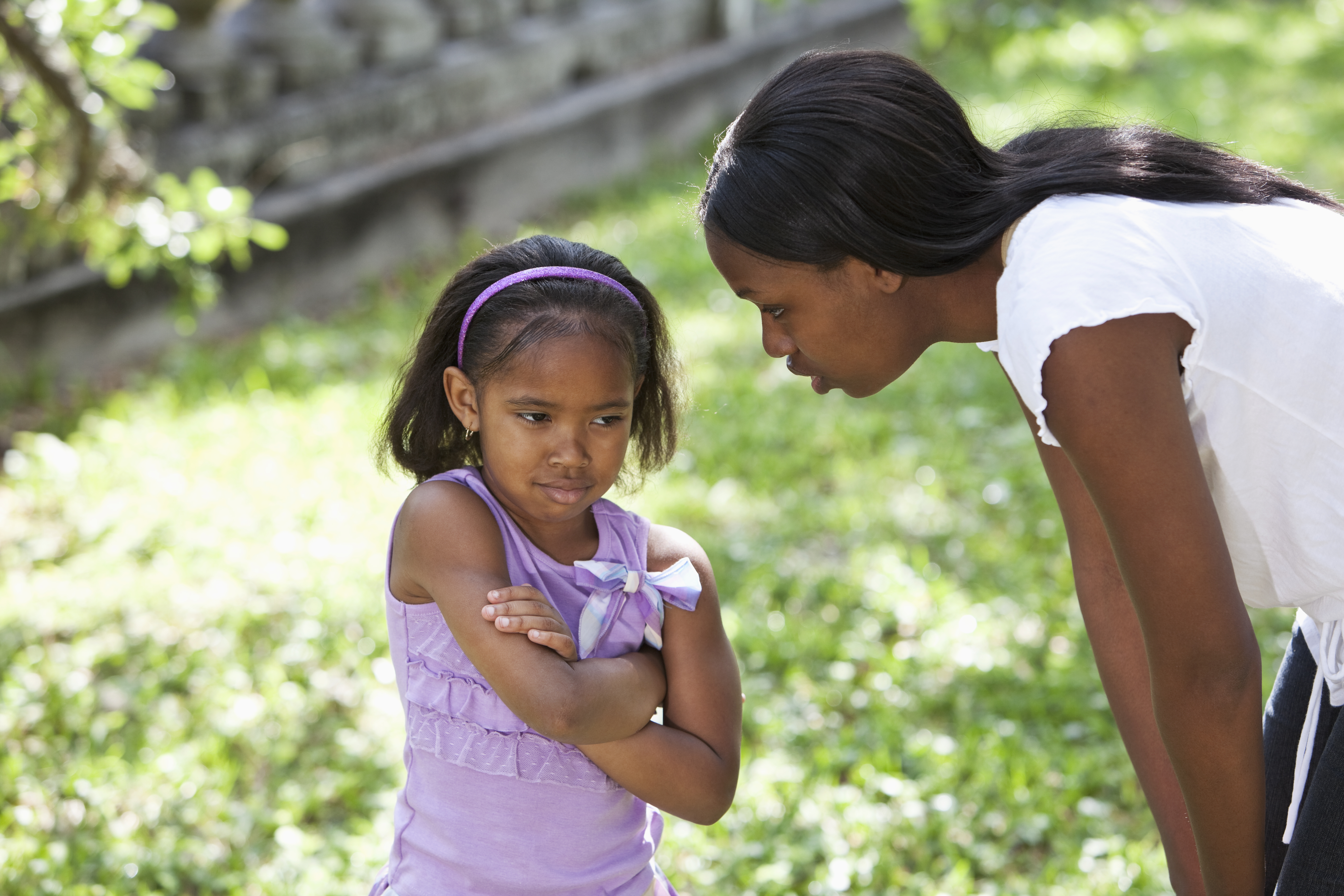 African American mother disciplining daughter