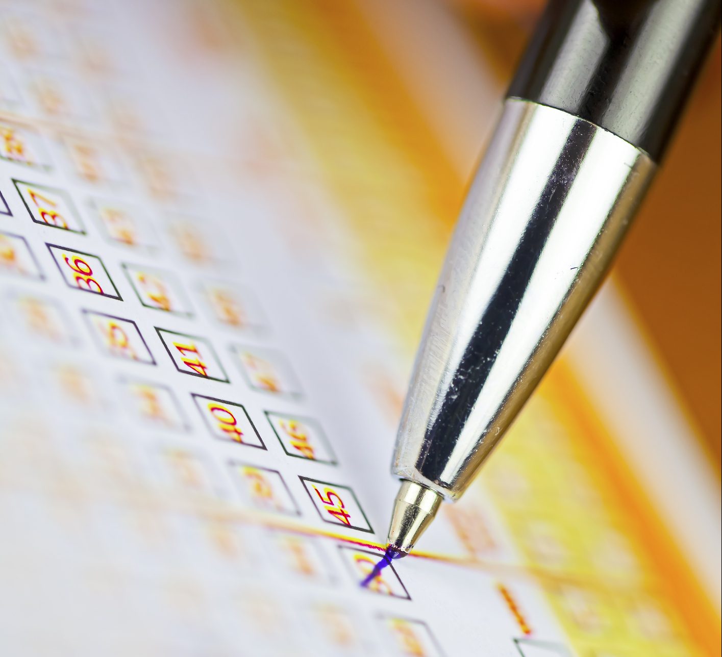 Pen markings on lottery ticket. Filled in lottery ticket